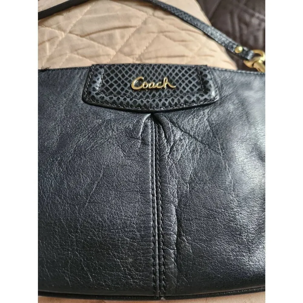 Coach Ashley large black leather wristlet. Approx 9.5 wide, 5.5 high